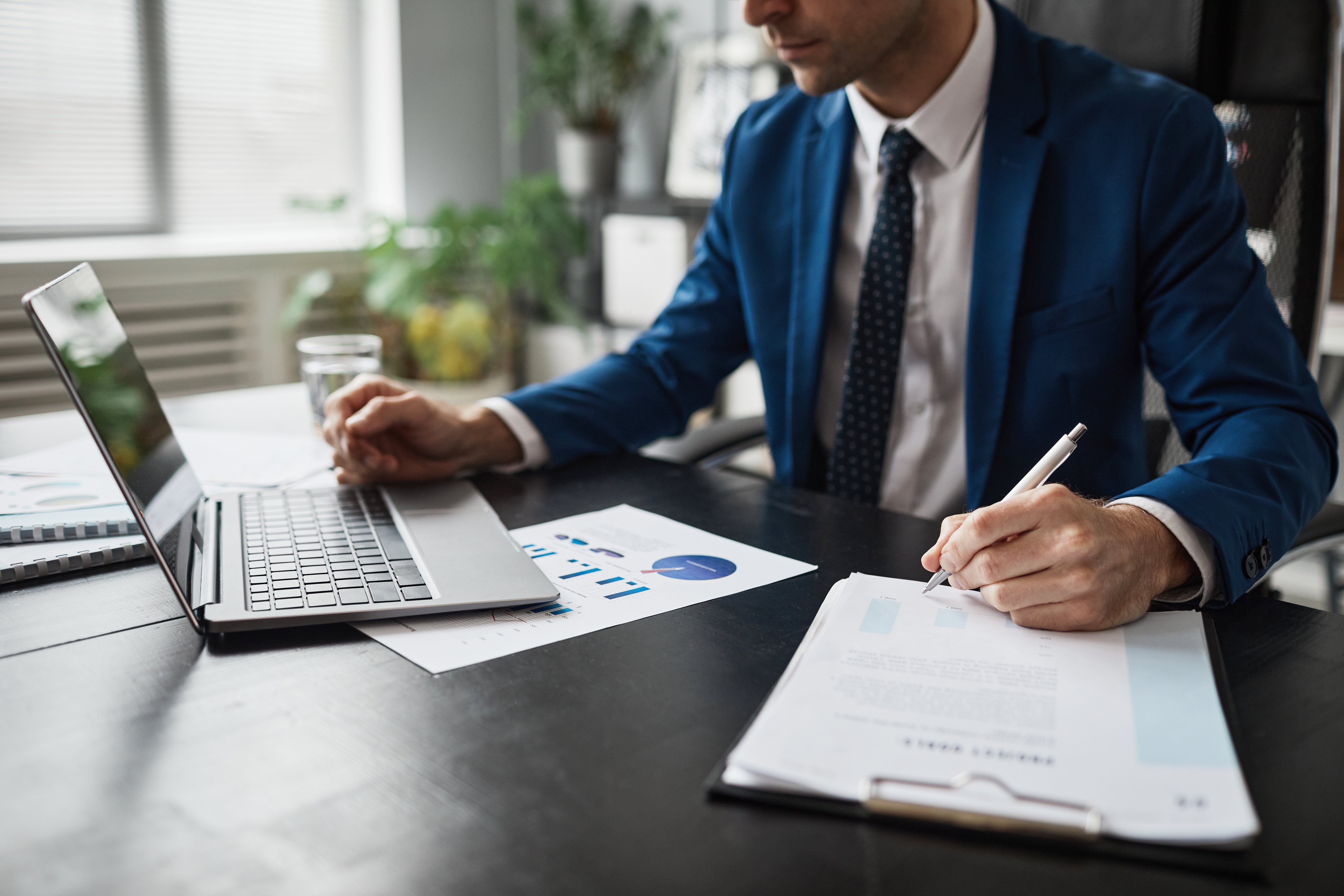 business-person-working-at-desk-2021-12-09-15-19-54-utc